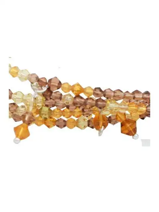 Detalle de brazalete sin fin con cristales austríacos amarillos