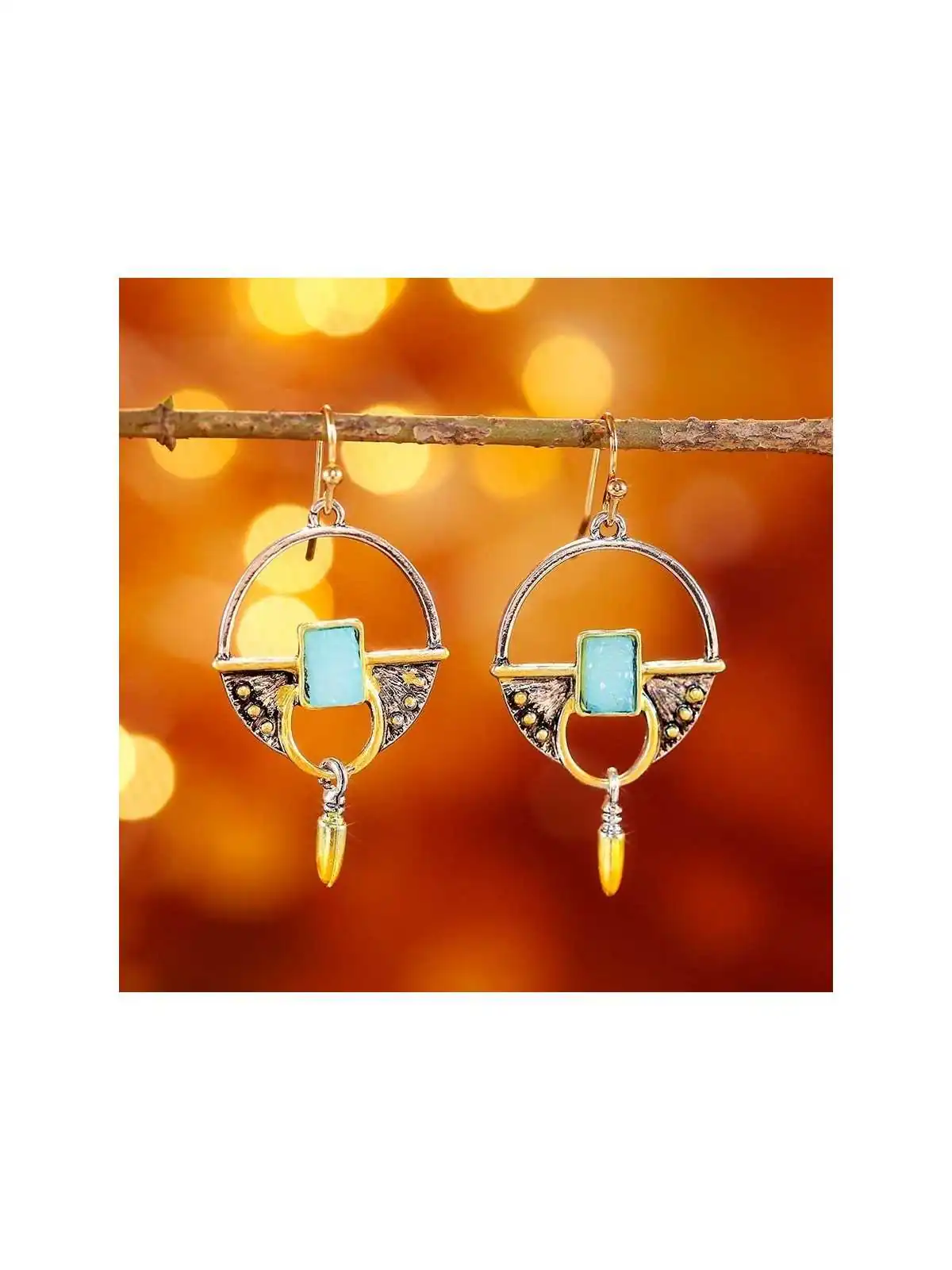 pendientes metálicos con colgante azul