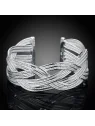 Brazalete en forma de banda metálica trenzada