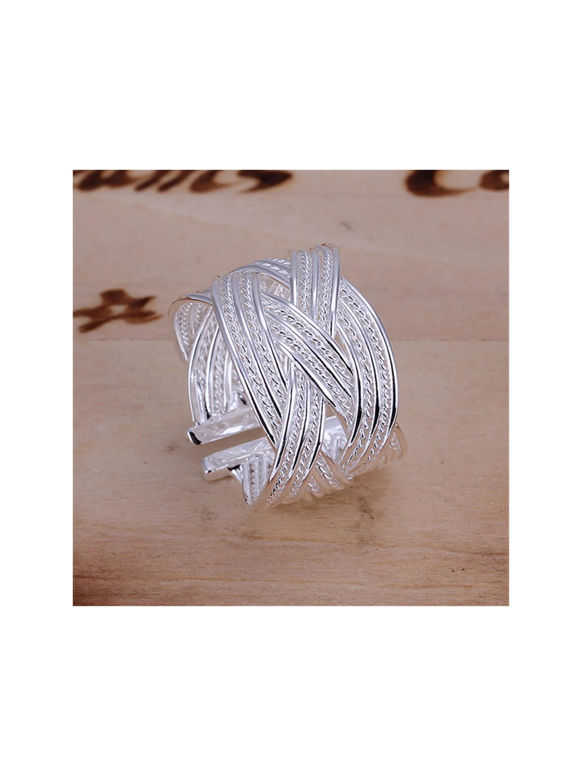 Brazalete abierto con trenza plateada