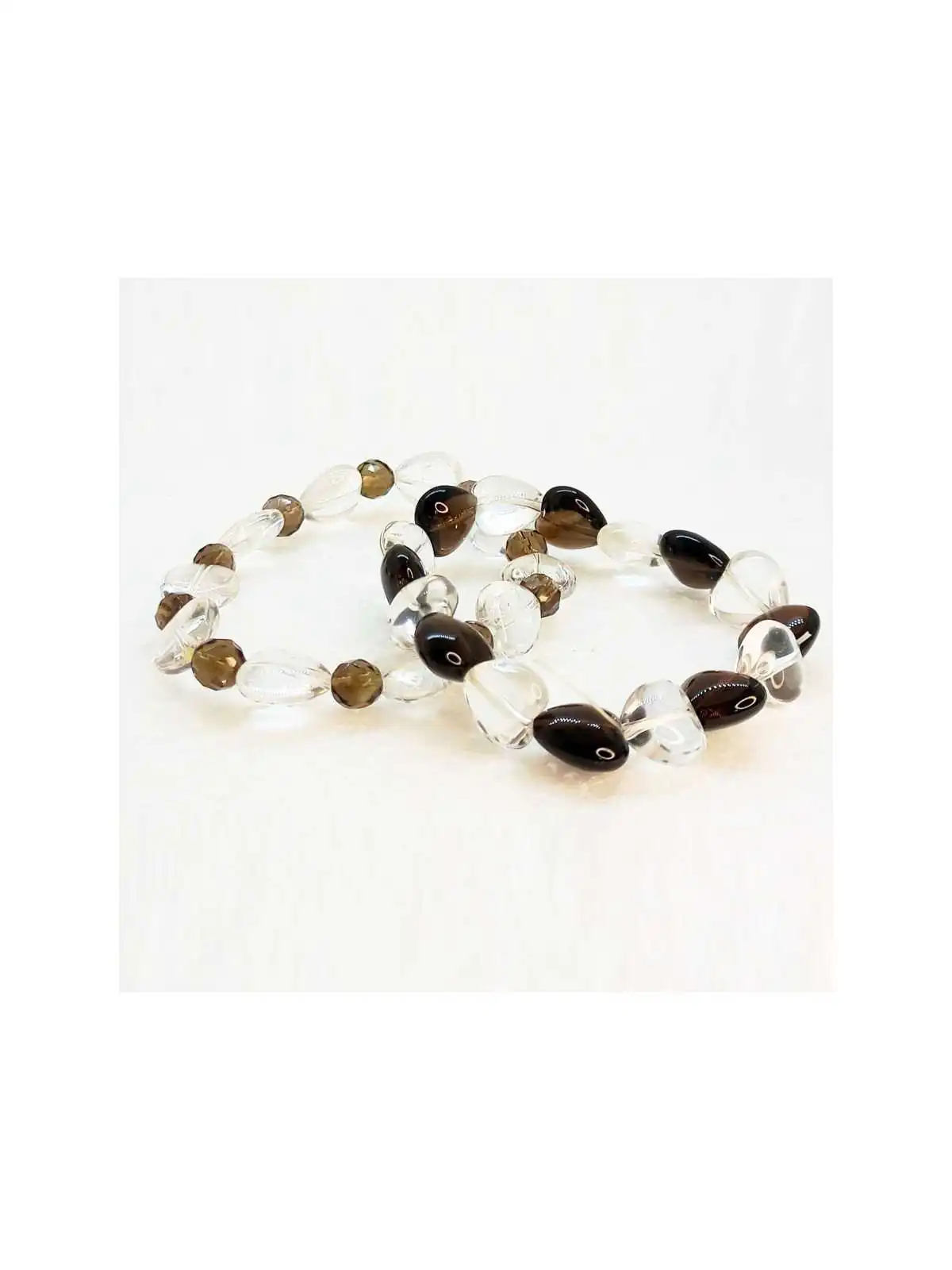 pulseras extensibles transparentes y humo
