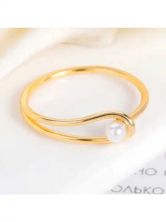 anillo minimalista dorado con perla