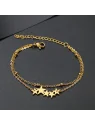 Pulsera doble con estrellas doradas
