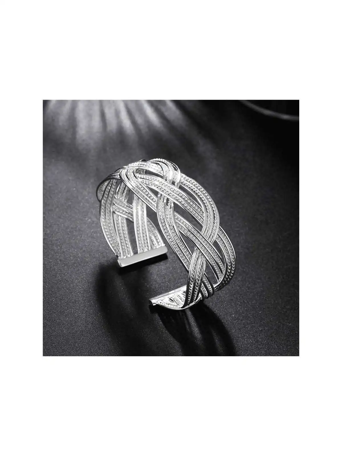 anillo plateado trenzado