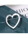 Broche metálico corazón plateado