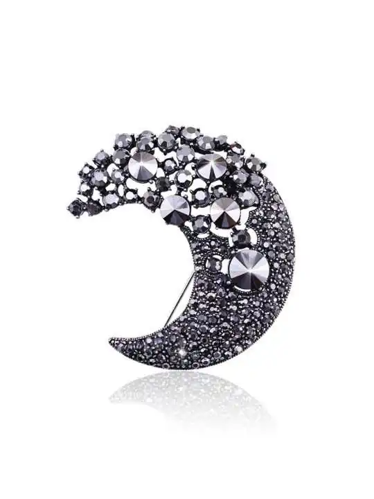 Broche de la luna negra creciente brillante
