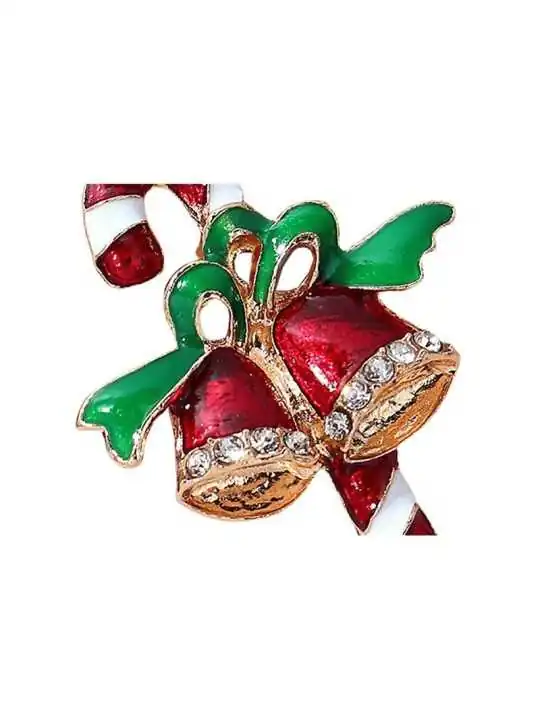 detalle de broche de la navidad con baston de caramelo