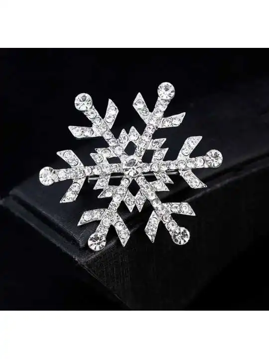 Broche estrella de la navidad magica