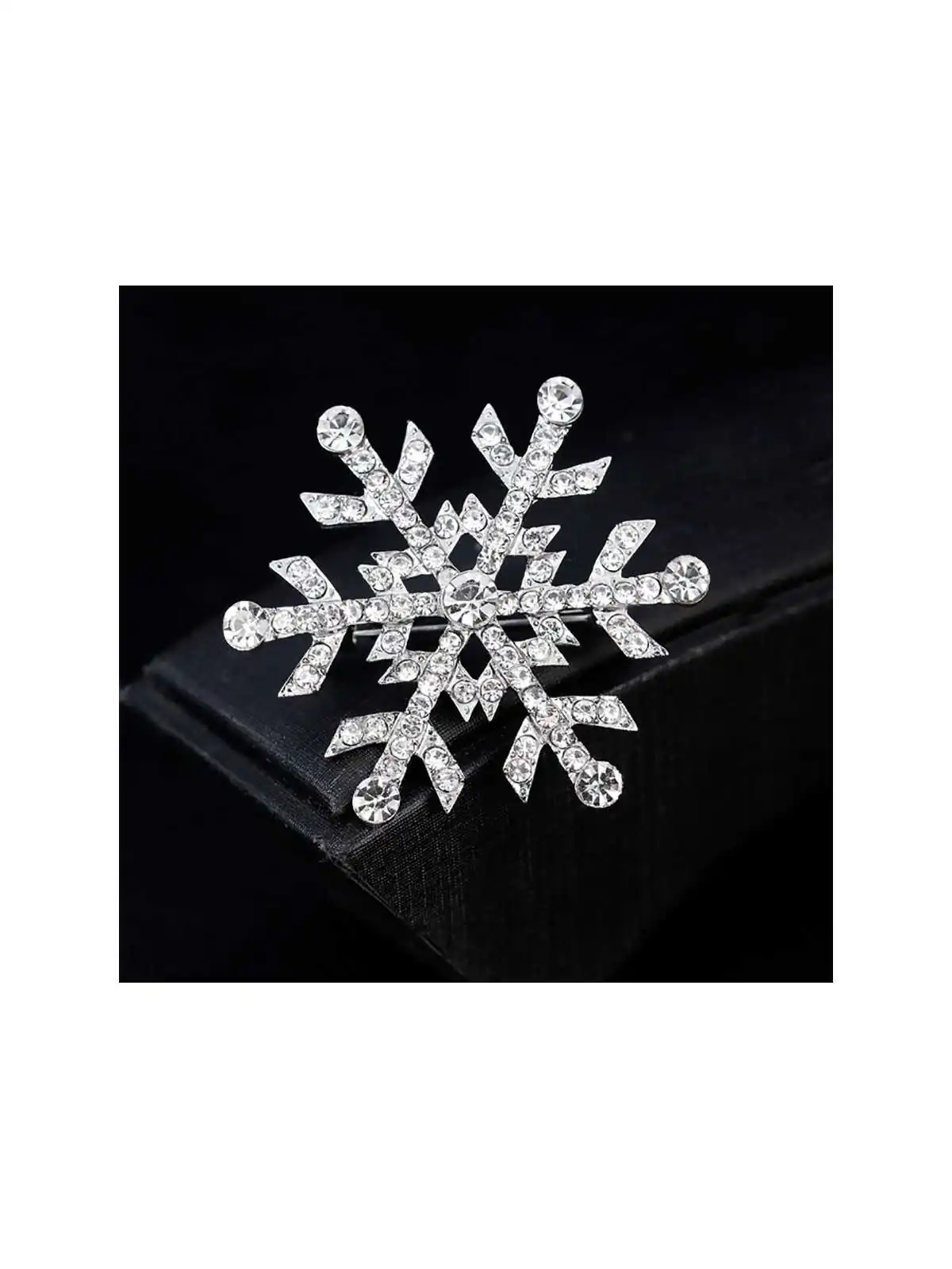 Broche estrella de la navidad magica