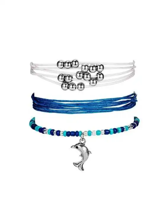 tres pulseras de cordon azul y blanco