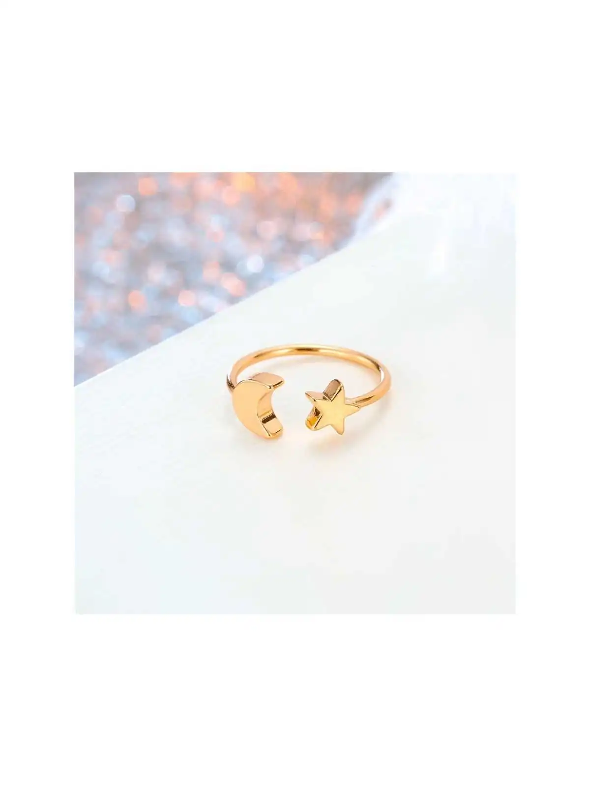 minianillo con luna y estrella dorados 