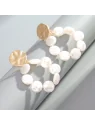 Pendientes moderos dorados con perlas de rio