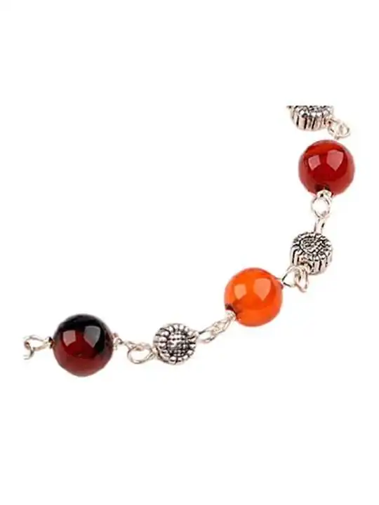 Detalle de pulsera de cuarzo multicolor