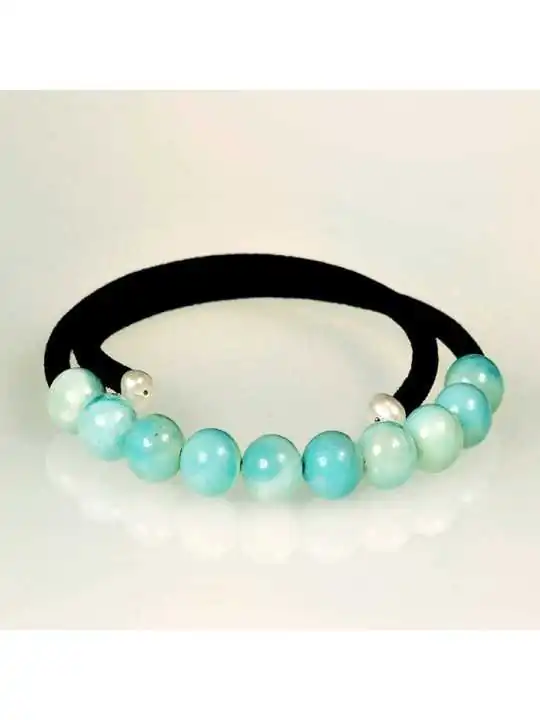Pulsera de terciopelo negro y aguamarinas