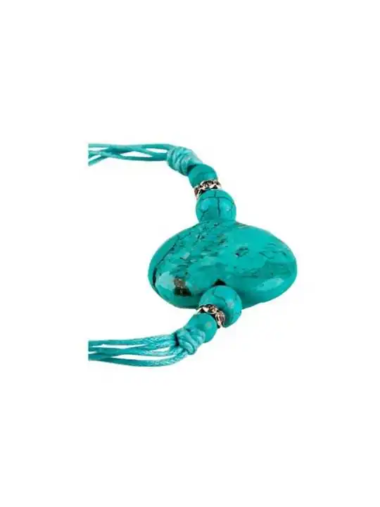 Detalle de pulsera con coraxón de howlita turquesa