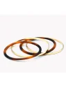 conjunto de pulseras doradas y resina de carey