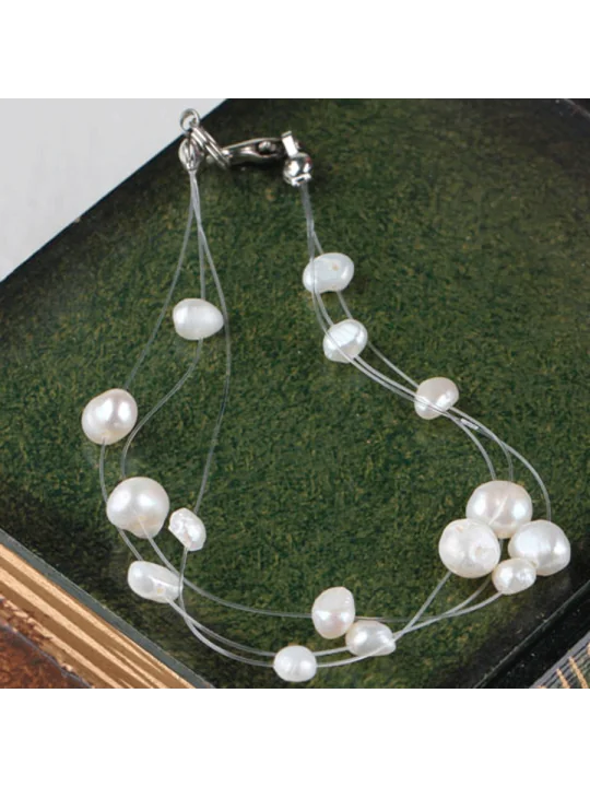 Pulsera al aire con perlas blancas de rio