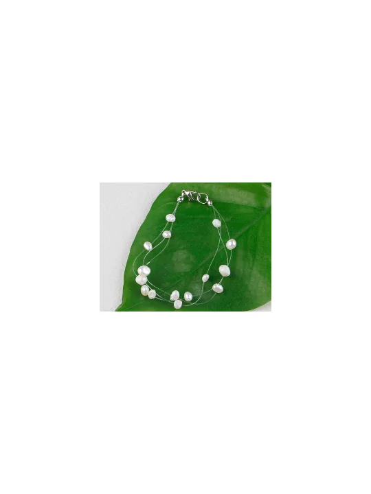 Pulsera al aire con perlas de rio blancas