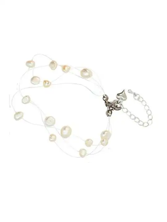 Pulsera al aire con perlas de rio blancas