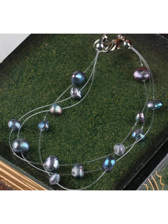 Pulsera muy ligera con perlas grises