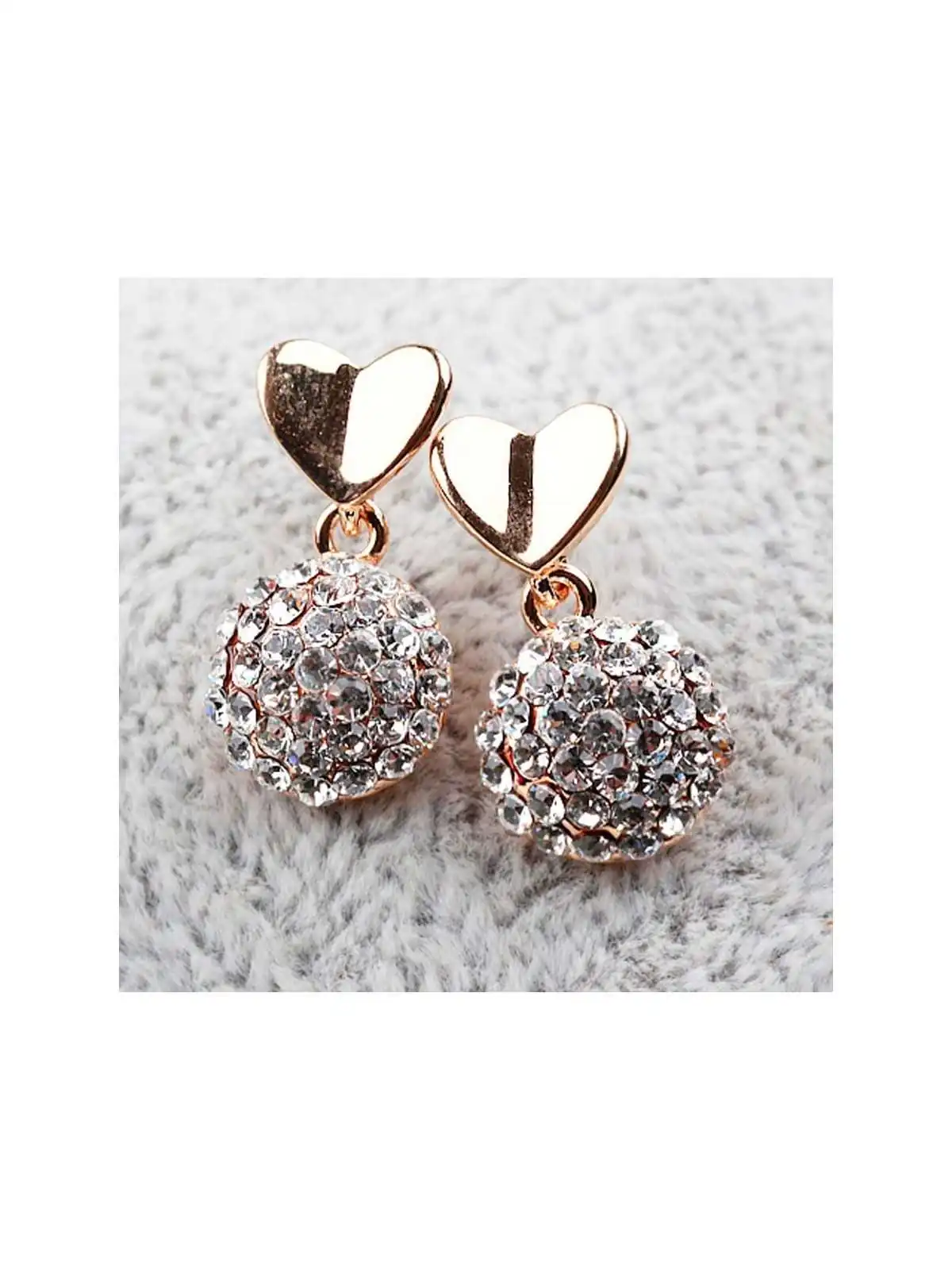 Pendintes de circonitas y corazón dorado