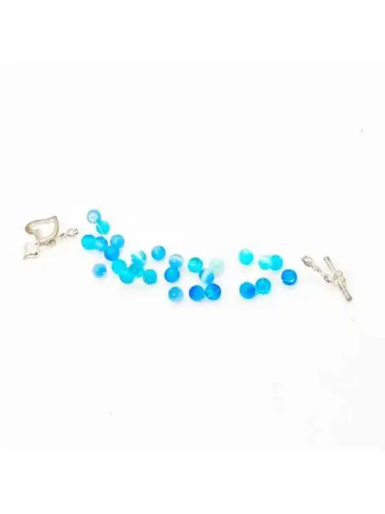pulsera al aire con ojos de gato azules