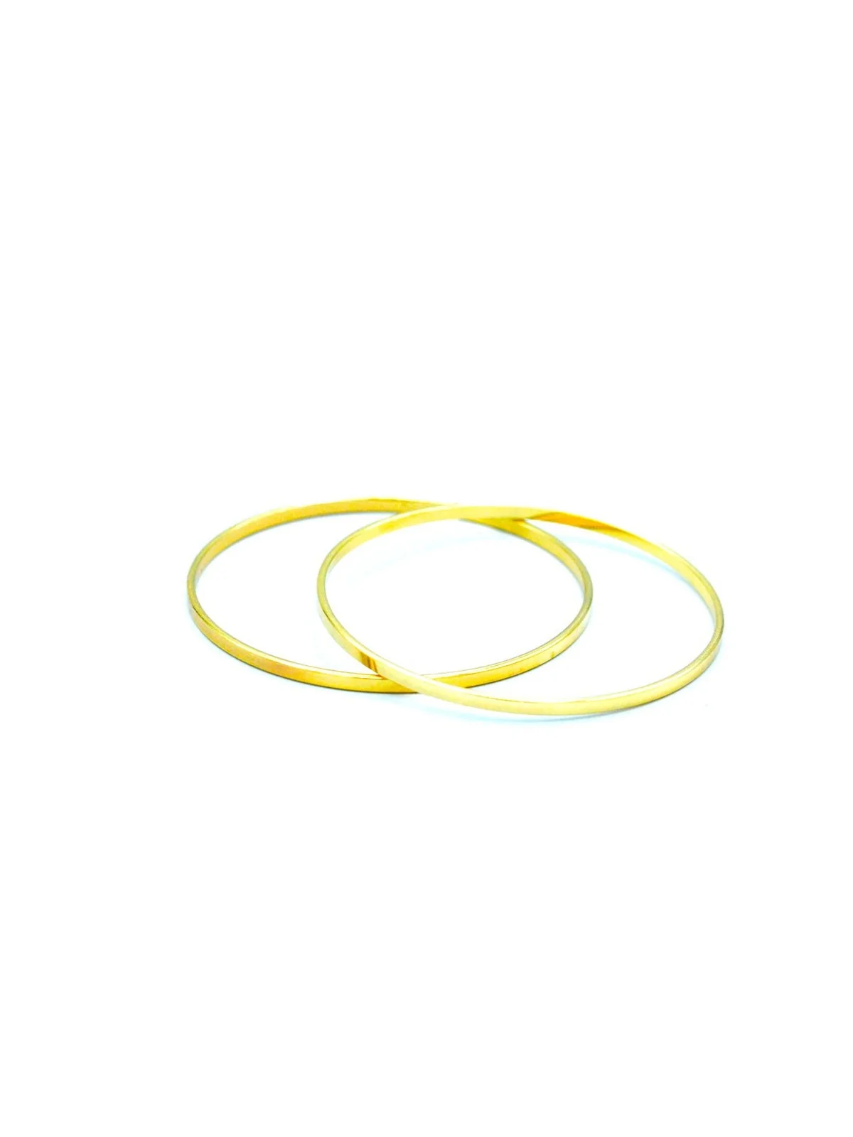 Pulseras finas de metal dorado