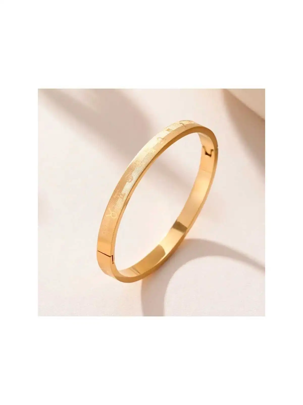 brazalete esclava de las constelaciones dorado