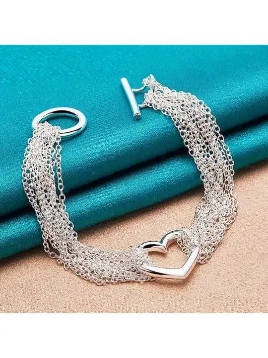 precioso brazalete multicadena plateado con corazon 
