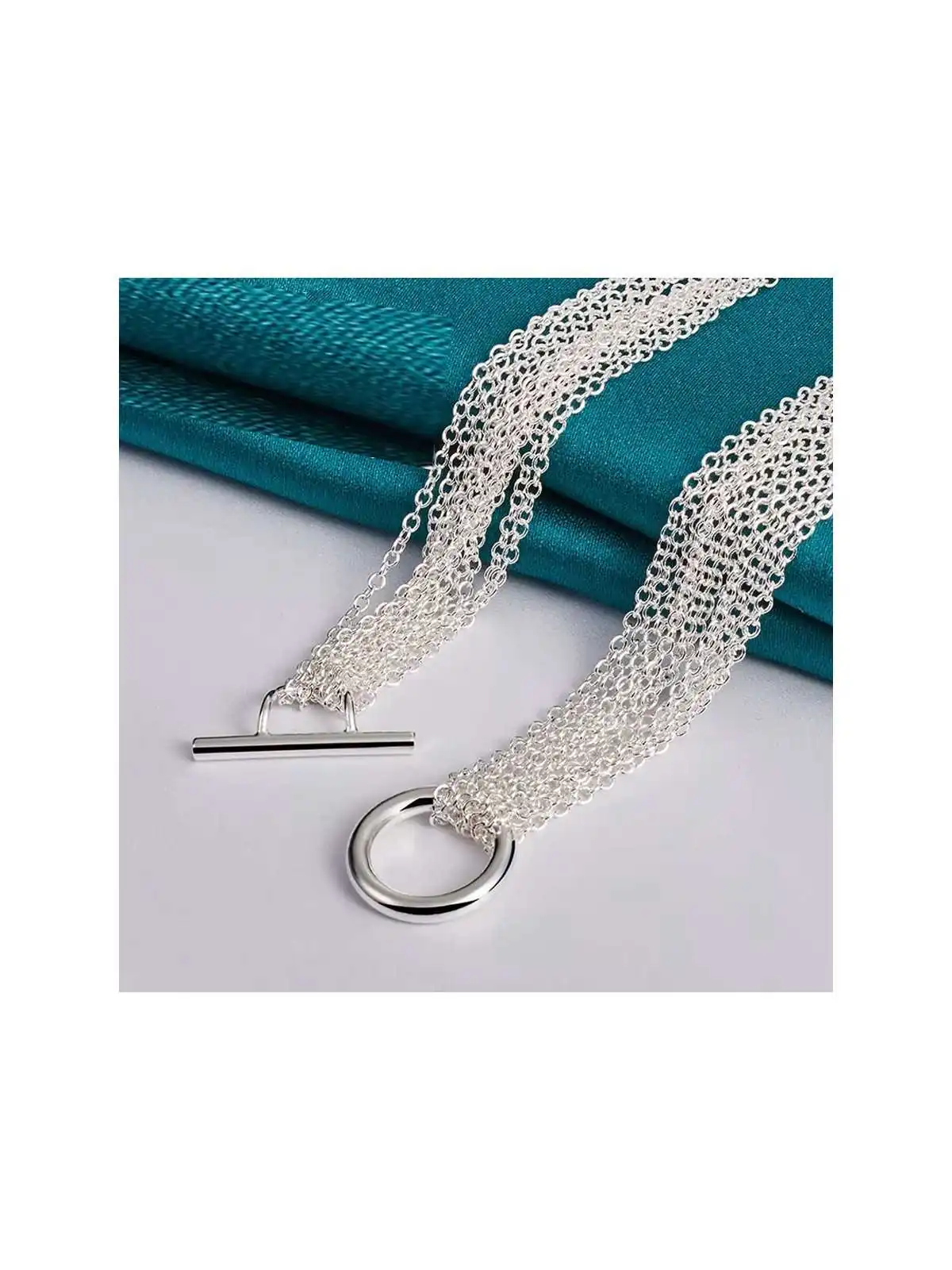 delicado brazalete plateado con multicadenas 