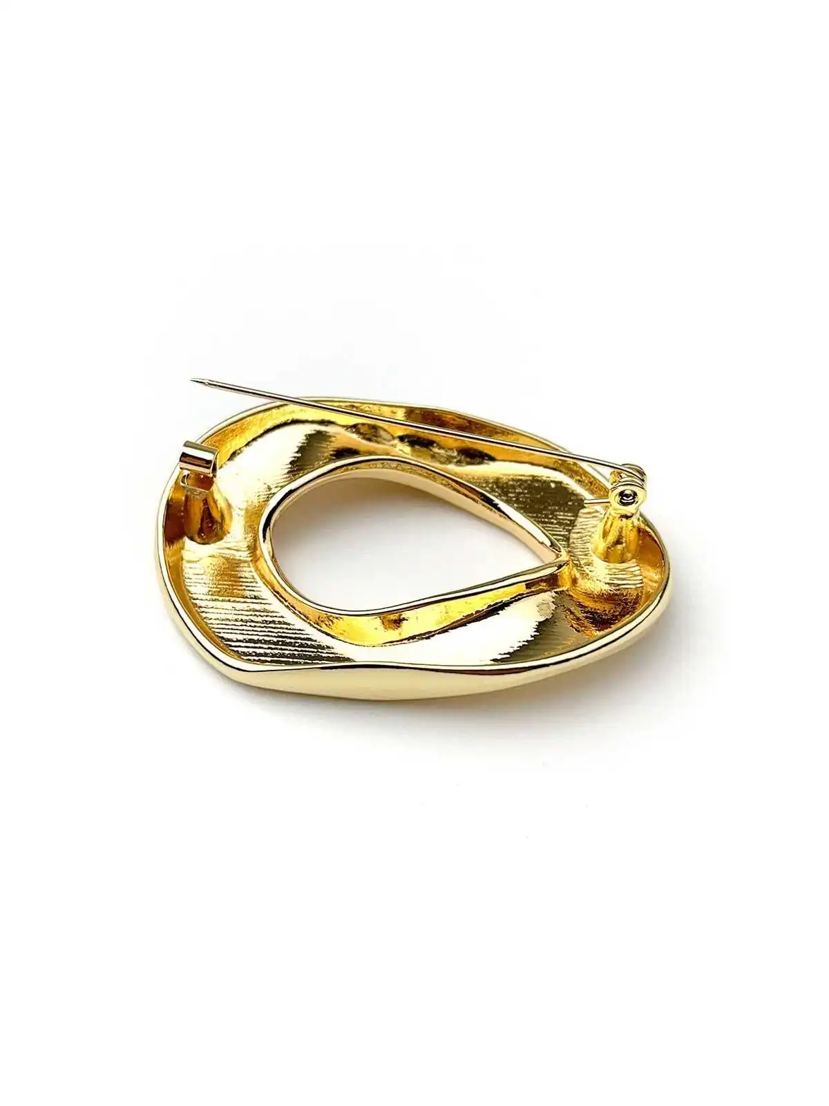 Broche hebilla dorada