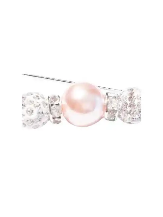 Detalle broche circonitas y perla rosa