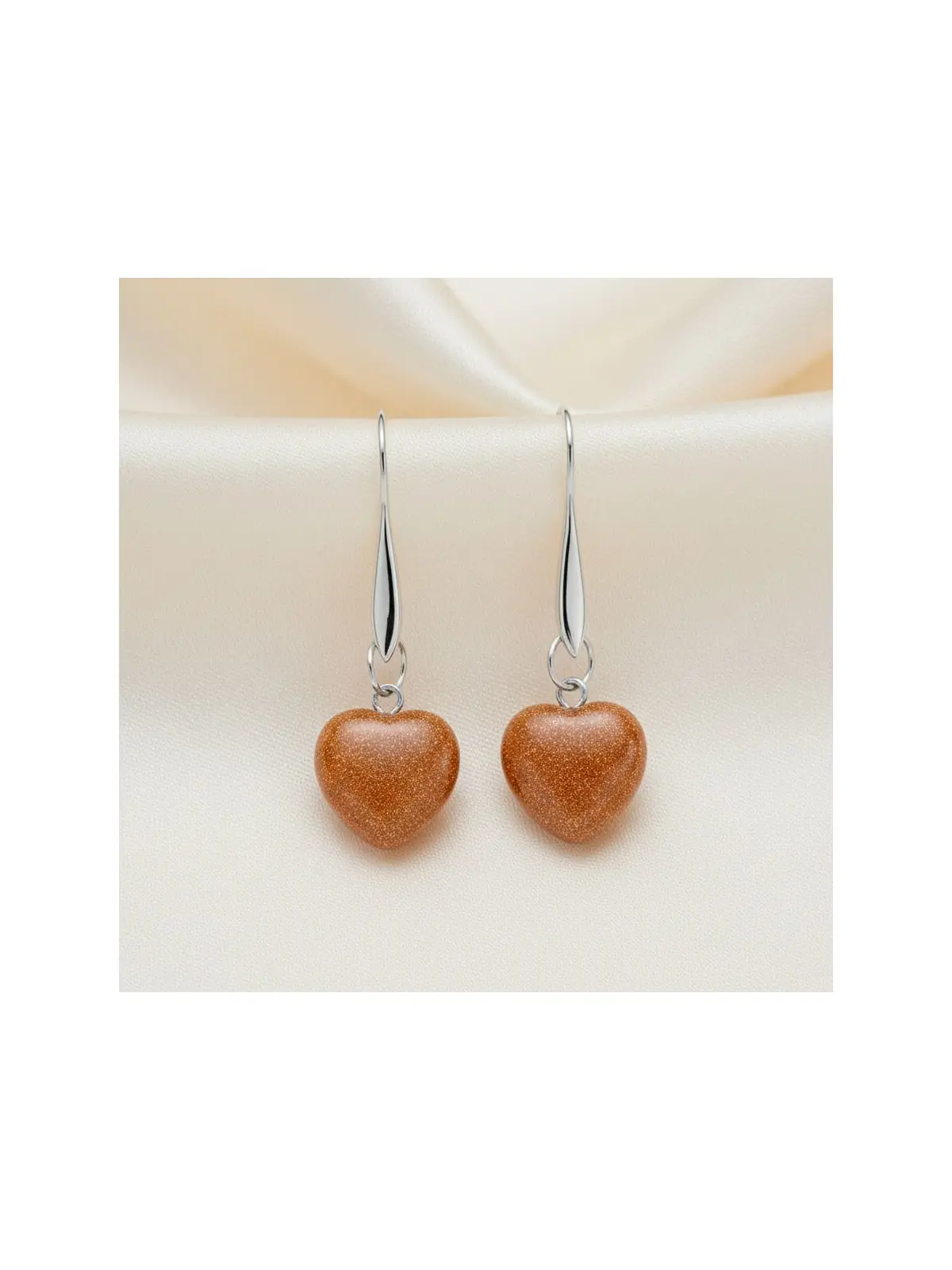 Preciosos pendientes con charms de piedra del sol natural con forma de corazón