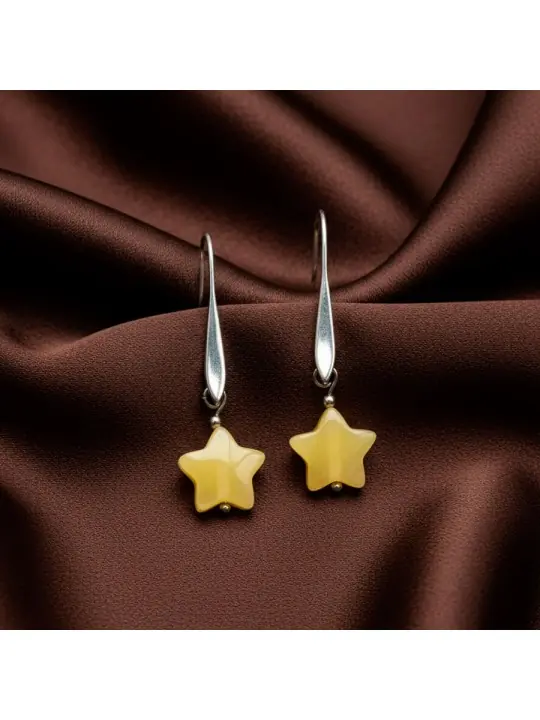 Preciosos pendientes con charms de piedra de gato amarillo en forma de estrella