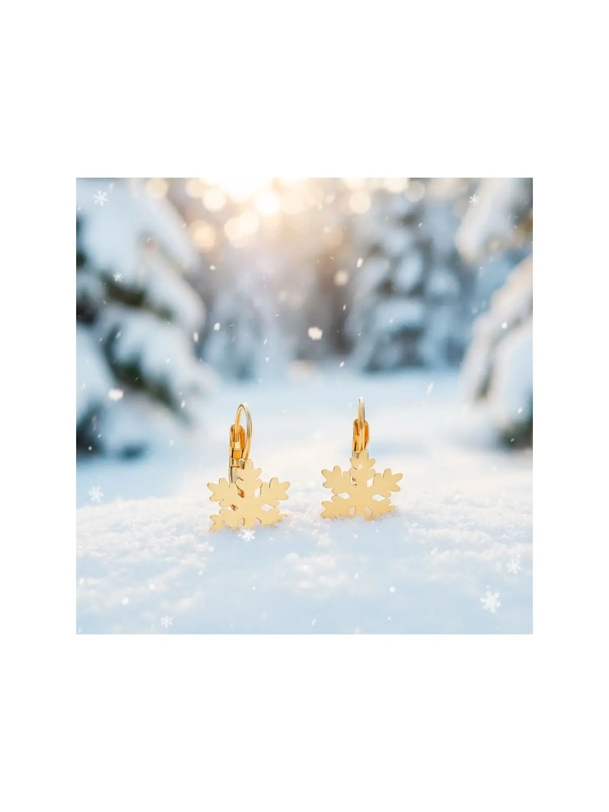pendientes dorados estrella de nieve en su entorno natural